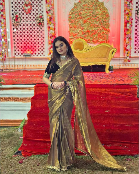Festive Golden Tissue Saree with Embroidered Lace Border