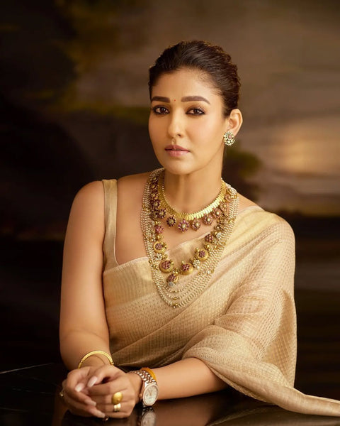 Traditional Nayanthara inspired tissue silk saree