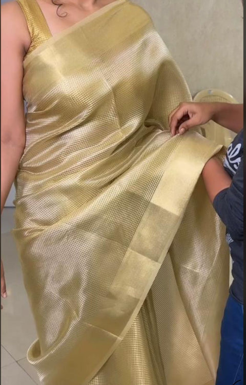 Traditional Nayanthara inspired tissue silk saree