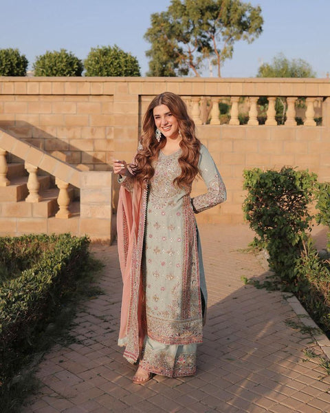 Pakistani Actress Salwar Kameez in Sky Georgette With Sequence Embroidery Work