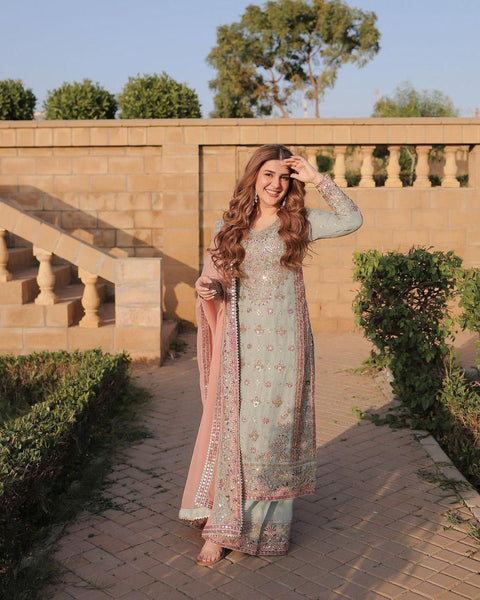 Pakistani Actress Salwar Kameez in Sky Georgette With Sequence Embroidery Work