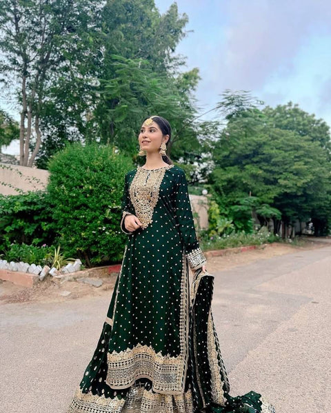 Luxury party wear with heavy embroidery and fully sticked gown suit and dupatta
