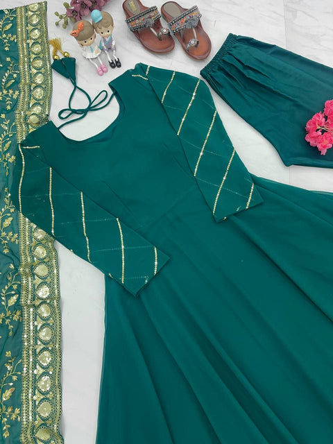Green Embroidery Work Plain Gown With Tassels