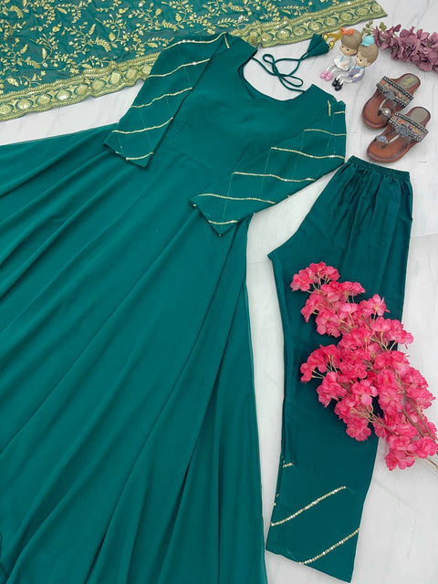 Green Embroidery Work Plain Gown With Tassels